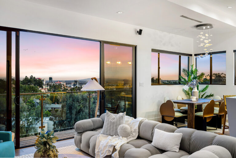 Modern living room with large windows and natural light